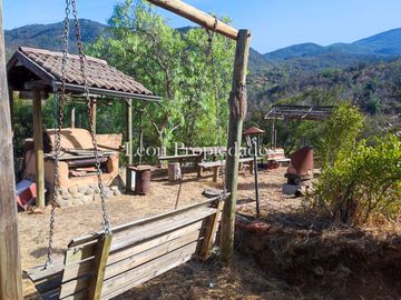 Leon Propiedades vende parcela con casa en sector las Achiras, Curacavi.