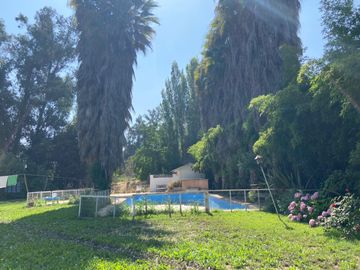 AMPLIA PARCELA CONDOMINIO EL ALMENDRAL PEÑAFLOR